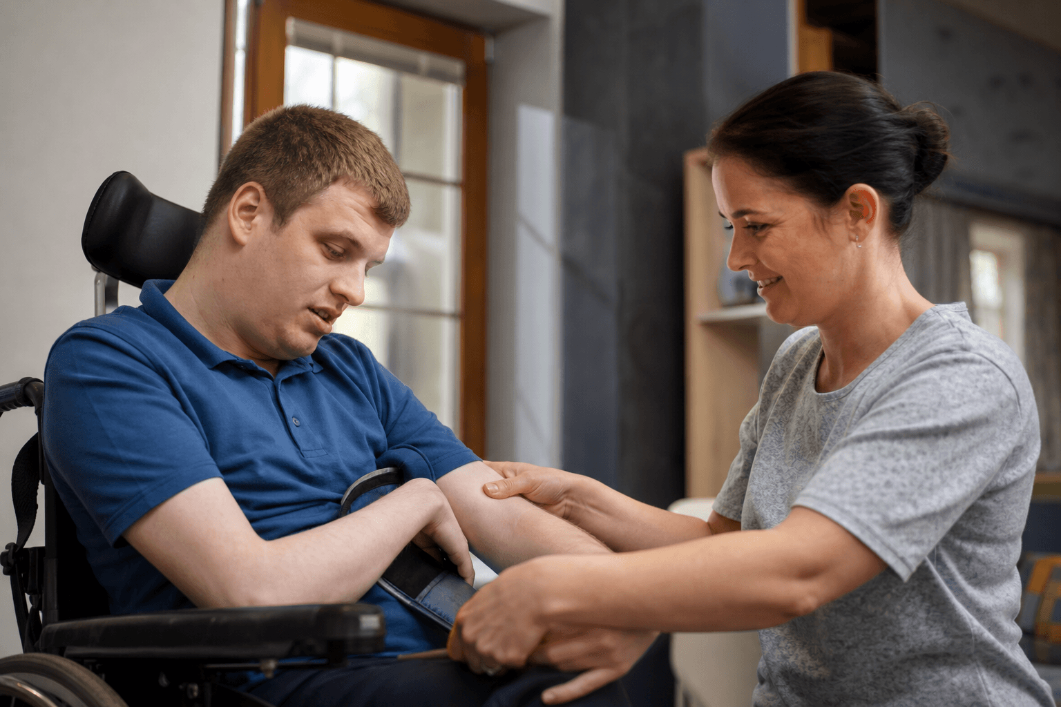 Specialist care worker assisting a client with specialist support needs
